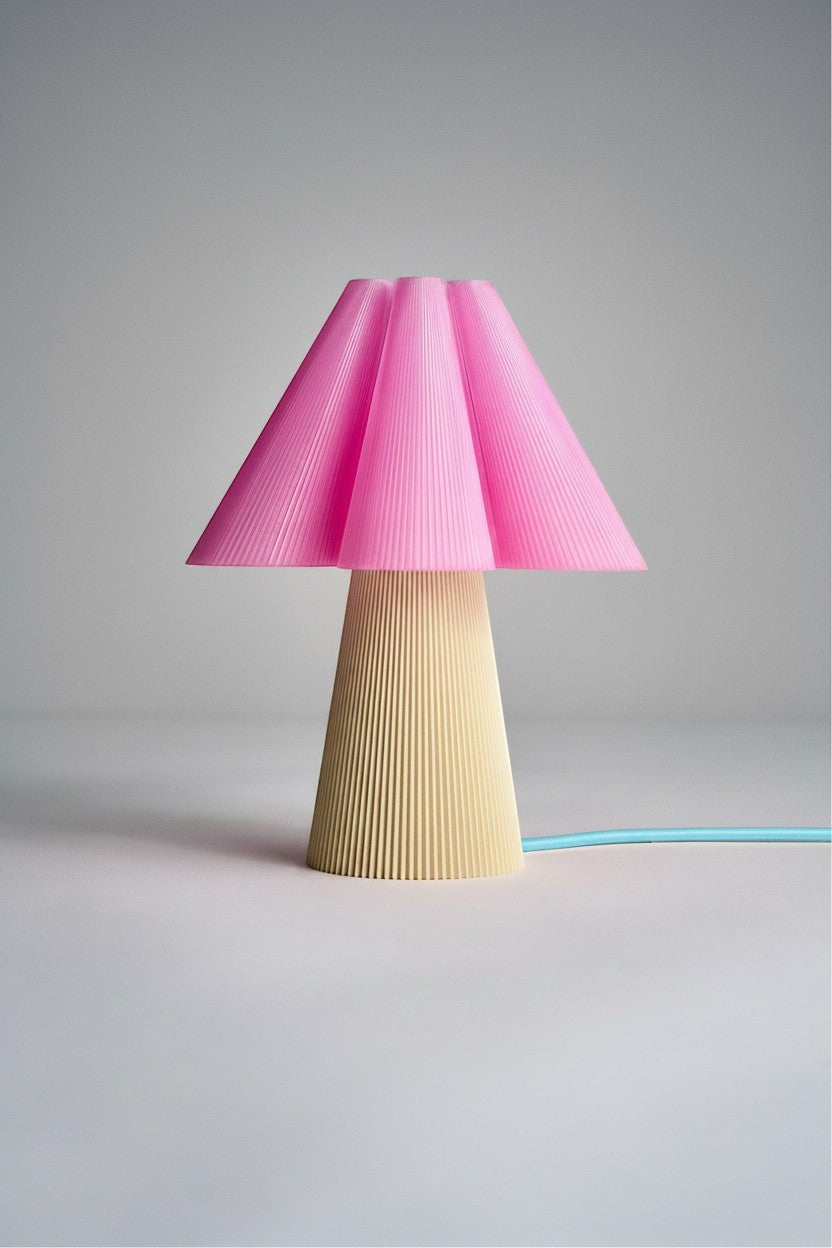 Layerd Bloom Flush table lamp with pink pleated shade and beige fluted base, E14 LED bulb included.